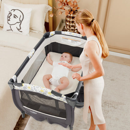 4 in 1 Portable Pack and Play Baby Nursery Center with Bassinet-Yellow - Color: Yellow